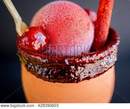 Delicious Cantarito With Tequila, Strawberry Snow, Chili Powder And Traditional Mexican Candy, With 