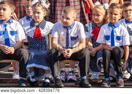 Krasnodar, Russia - September 1, 2020: First-form Schoolchildren At School On Holiday Of Beginning O