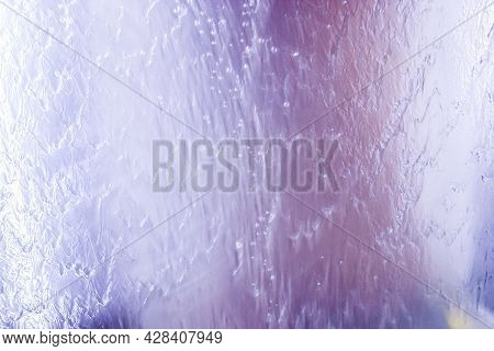 Polished Stainless Steel Sheet Metallic Surface With Water Flowing Over It