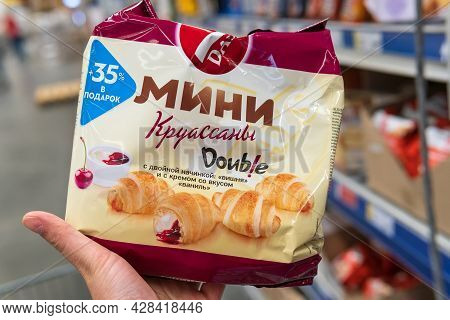 Tyumen, Russia-june 08, 2021: 7days Mini Croissant Vanilla And Cherry. Selective Focus
