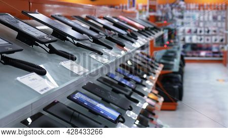 Maikop, Republic Of Adygea, Russia - July 21, 2021: Demonstration Shelves With Tablets In The Electr