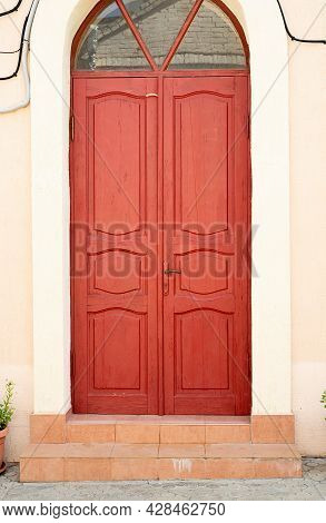 Architecture Details, Bright Red Door And Strairs Outdoors On The Street