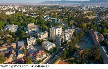 Aerial View Of The Cityscape Of Nicosia, The Capital City Of Cyprus. Drone Panorama Photograph