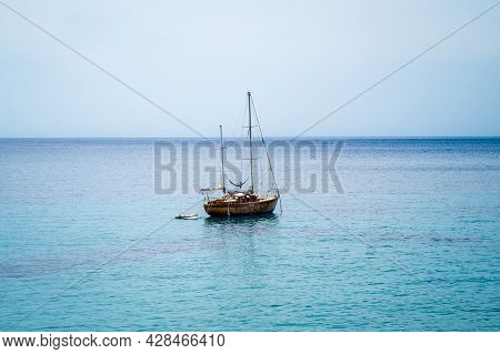 Single Boat On Calm Sea No Clouds