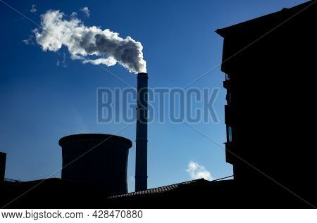 Bucharest, Romania - January 15, 2021: Chimney Of Cet Progresul Power Plant, Pollute With Smoke From