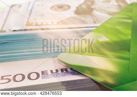 Cash And Non-cash Money.  Plastic Cards In Cash And Credit Cards As A Concept Of Bank Deposits.