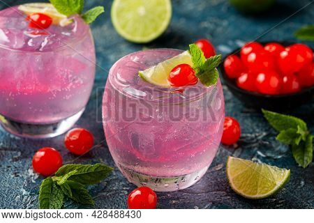 Cherry Limeade Or Lemonade In Drinking Glass. Refreshing Summer Drink.
