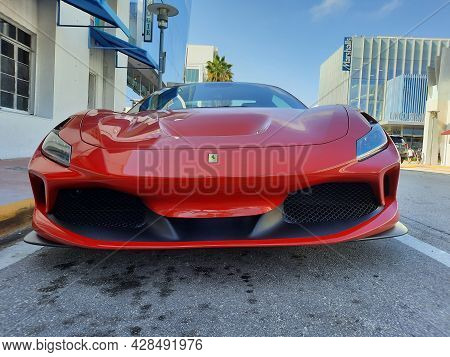 Los Angeles, California Usa - March 24, 2021: Red Ferrari F8 Tributo Luxury Sport Car Low Front View