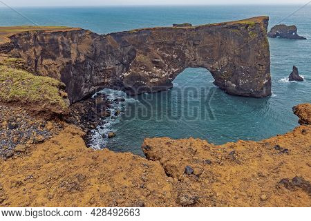 Natural Arch Near Vik, Iceland. Dyrholaey Peninsula