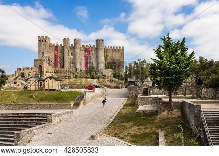 Obidos, Portugal - June 30, 2021: On Top Of Of The Hill In Obidos Lies This Beautiful Castle