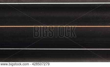 Road Markings Of The Highway. Texture Of Asphalt With Dividing Lines. Top View. White Dividing Line 