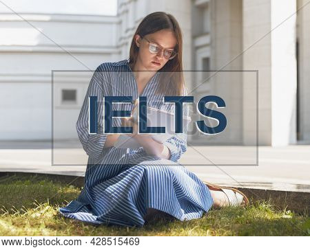 Ielts Word. Woman Learning, Studying And Preparing For English Language Exam.