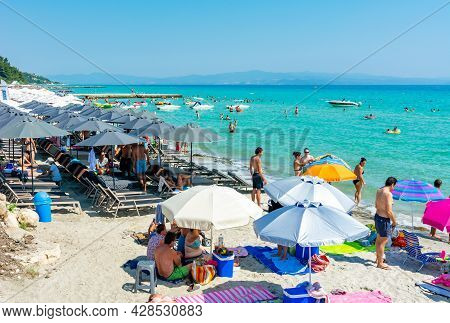Halkidiki, Greece - July 2019: People On Kalithea Beach, Kassandra Peninsula