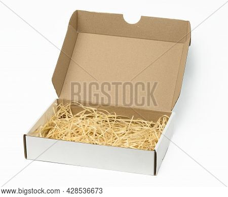Rectangular Open Corrugated Paper Box With Sawdust Inside. Packaging, Containers For Transportation