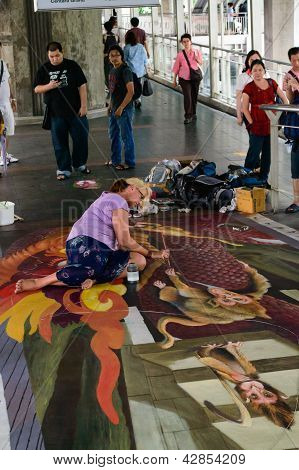 Bangkok - 3. marts: En kunstner (julie Kirk Purcell) under tegning og maleri hans 3D illustrationer i Liv