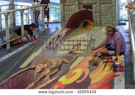 Bangkok - 3. marts: En kunstner (julie Kirk Purcell) under tegning og maleri hans 3D illustrationer i Liv