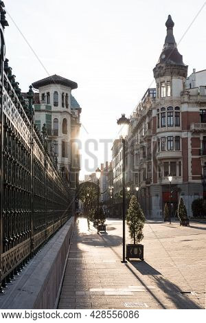 Oviedo, Spain - December 30, 2019: Principado Streer In The Old Town Of Oviedo With The Sun At Sunri