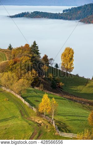 Morning Foggy Clouds In Autumn Mountain Countryside.  Ukraine, Carpathian Mountains, Transcarpathia.