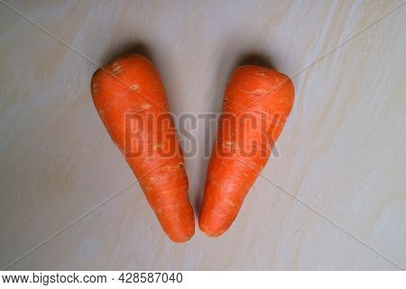 Two Small Carrots Ready To Cook Photo