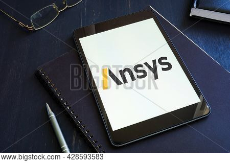 Kyiv, Ukraine - June 30, 2021. Ansys Engineering Simulation Logo On The Smartphone And Notepad.