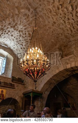 Jerusalem, Israel, July 17, 2021 : A Large Chandelier Hangs From The Ceiling In The Interior Of The 