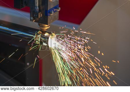 The Fiber Laser Cutting Machine Cutting The Stainless Steel Tube Control By Cnc Program. The Sheet M