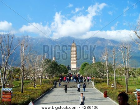 Pagoda From Afar With Mountains And Skies