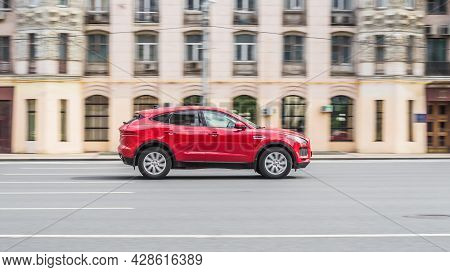 Jaguar E-pace X540 Is Driving On High Speed In Front Of Classic Vintage Building. Moscow, Russia - J