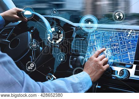 Man Using Navigation System While Driving Car, Closeup