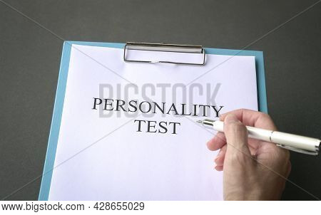 Job Applicant To Do Personality Test. On Dark Grey Tabletop.