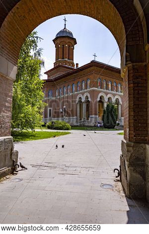 Church Behind An Arch Tunnel In Craiova, Romania