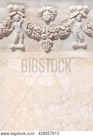 Retro background with ancient carved ornament with cupids and a flower garland. Vertical banner with stone bas-relief, Hierapolis, Pamukkale, Turkey. Mock up template. Copy space for text