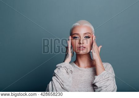 Millenial Young Woman With Short Blonde Hair Portrait Doing Face Yoga Self Facebuilding Massage For 