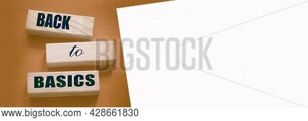 The Words Back To Basics Made Of Letters On Wooden Blocks. Back To Basics - Fundamental Principles C