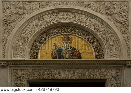 Trieste, Italy, 31 December 2017. Murano Glass Mosaics On The Facade Of The Church Of St. Spiridon  