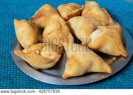 Homemade Samosa, Samsa Or Smosa. A Vegetarian Spicy Indian Special Traditional Street Food. Iftaari 