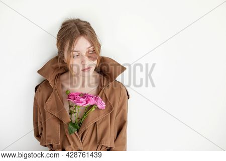 Woman With Hyperpigmentation On Face With Flowers