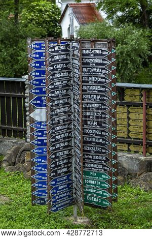 Criseni, Harghita, Romania-june 20: Decorative Indicators In The Courtyard Of The Straw Hat Museum O