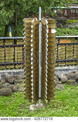 Criseni, Harghita, Romania-june 20: Decorative Indicators In The Courtyard Of The Straw Hat Museum O