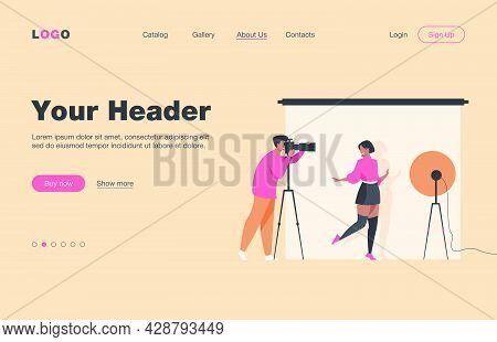 Professional Photographer Taking Pictures Of Young Woman. Female Model Posing For Camera Against Whi