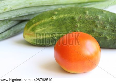 Vegetables On A Light Background. Vegetables Is A Culinary Term For The Edible Part Of The Fruit Or 
