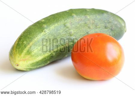 Vegetables On A Light Background. Vegetables Is A Culinary Term For The Edible Part Of The Fruit Or 