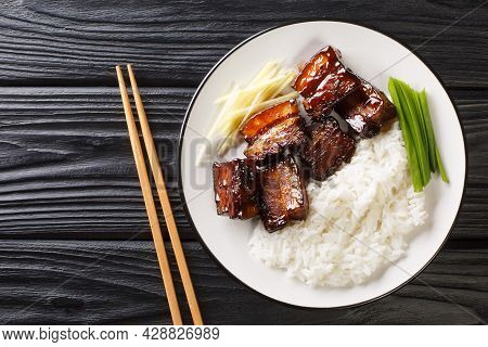 Okinawan Braised Pork Belly Dish Called Rafute Closeup In The Plate On The Table. Horizontal Top Vie