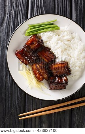 Rafute Okinawan Braised Pork Belly With Rice Closeup In The Plate On The Table. Vertical Top View Fr