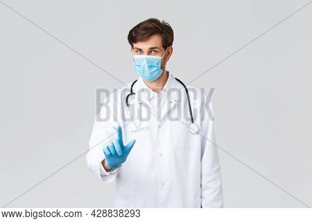 Hospital, Healthcare Workers, Covid-19 Treatment Concept. Professional Doctor In White Scrubs, Medic