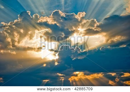 Beautiful heavenly landscape with the sun in the clouds.