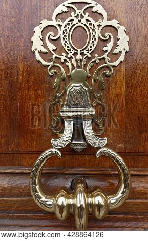 European Vintage Old Metal Wrought Iron Door Knocker. Design Detail. Paris.