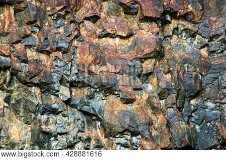 Black And Brown Rocky Cliff Face Texture 02