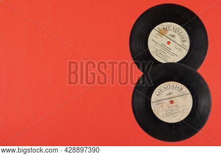 Two Old Vinyl Records Of Soviet Music On Red. 1960-1970. Popular Pop Songs Of The Ussr Are Sung By M
