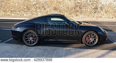 Zadar, Croatia - July 30, 2021: Porsche Carrera S In A City Parking Lot In Zadar, Dalmatia, Croatia.